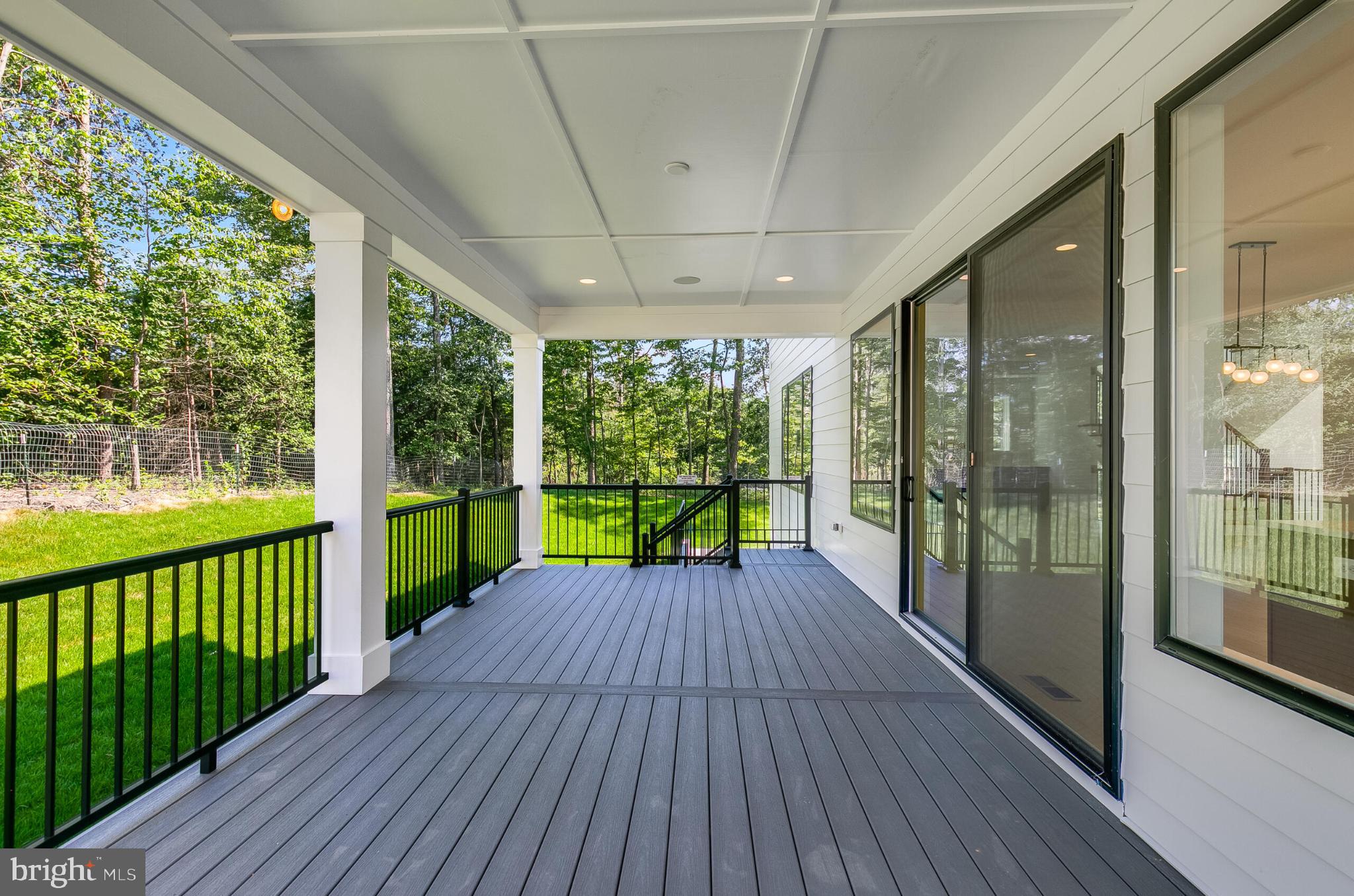 9209 Franks Point Lane Lorton, VA 22079 - Photo 4 of 16 a view of a porch with wooden floor