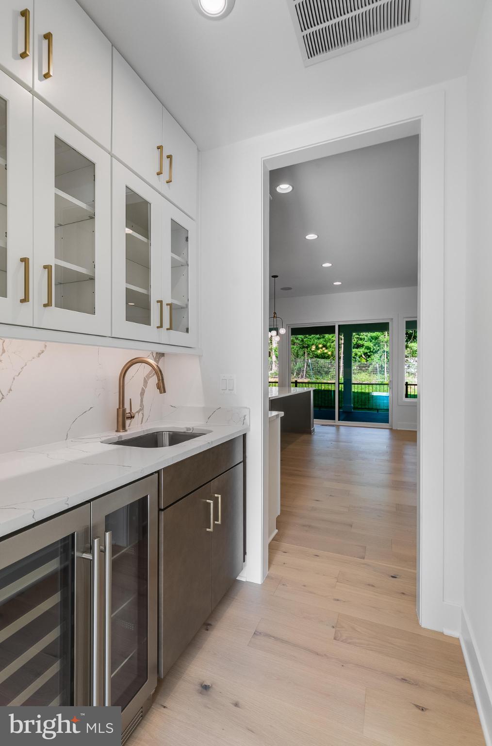 9209 Franks Point Lane Lorton, VA 22079 - Photo 10 of 16 a view of a kitchen with a sink and a large window