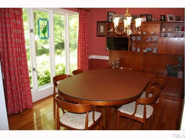 Dining room has beautiful hardwood floors and these great windows bring in lots of light. Dining Room