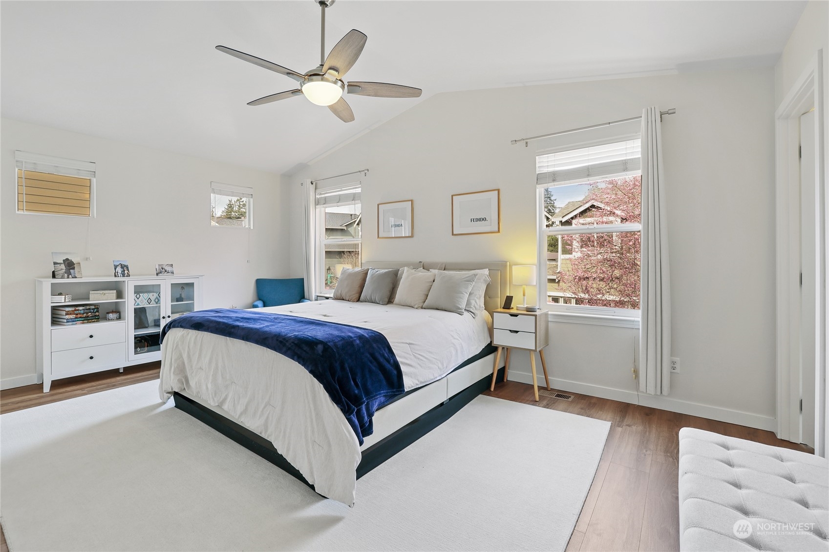 107 202nd Street Southeast Bothell, WA 98012 - Photo 17 of 34 a spacious bedroom with a bed and a window