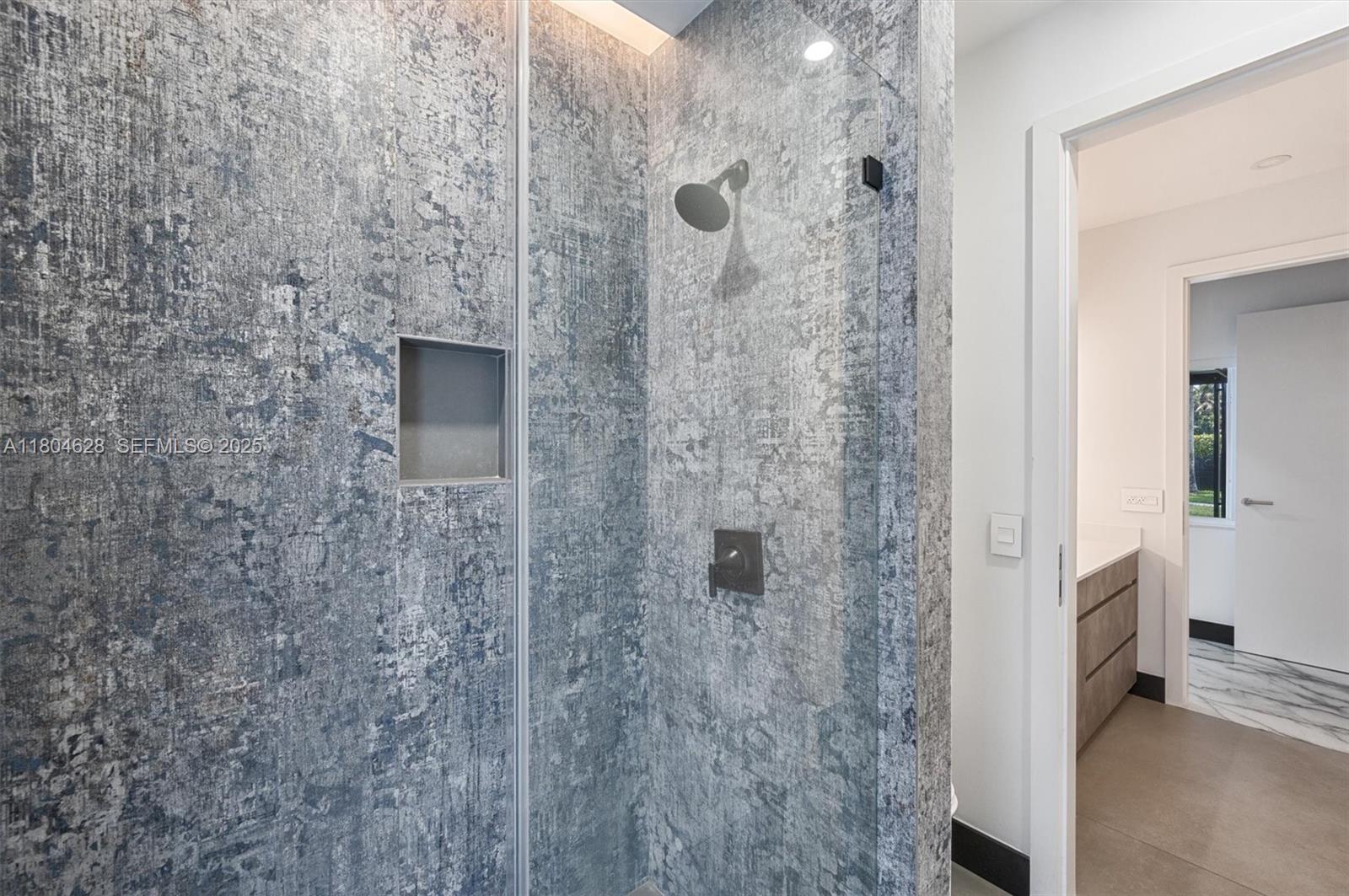 5121 Southwest 210th Terrace Southwest Ranches, FL 33332 - Photo 30 of 70 a bathroom with a shower and a sink