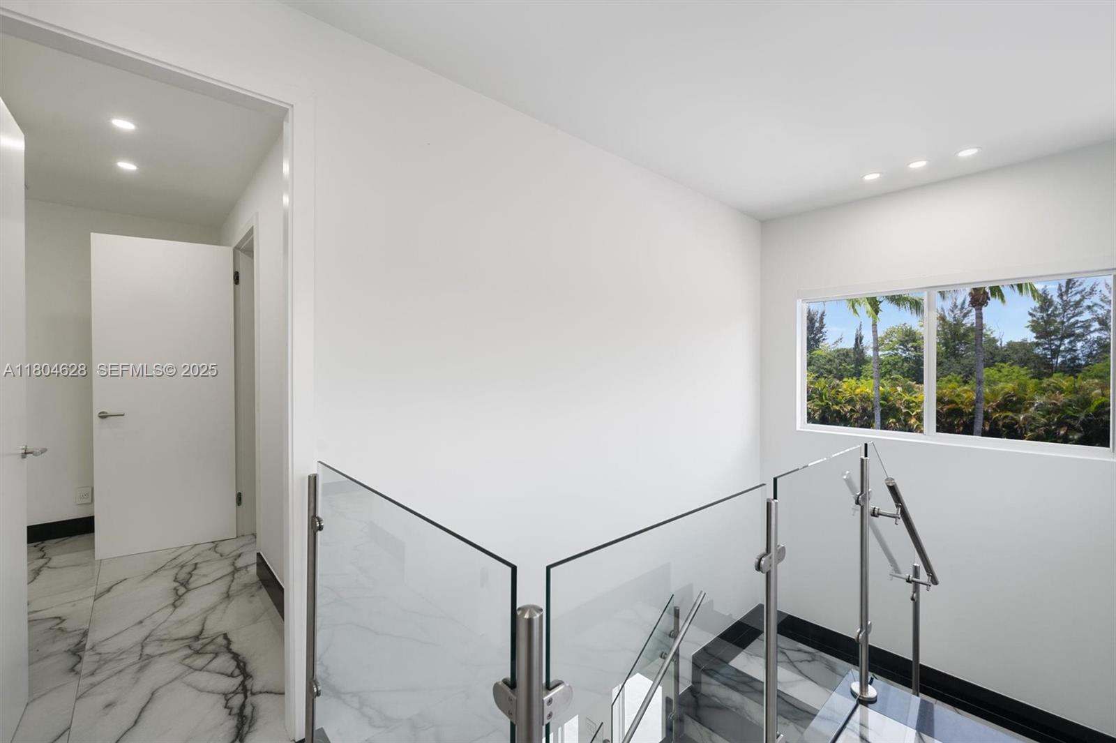 5121 Southwest 210th Terrace Southwest Ranches, FL 33332 - Photo 46 of 70 a view of hallway with stairs
