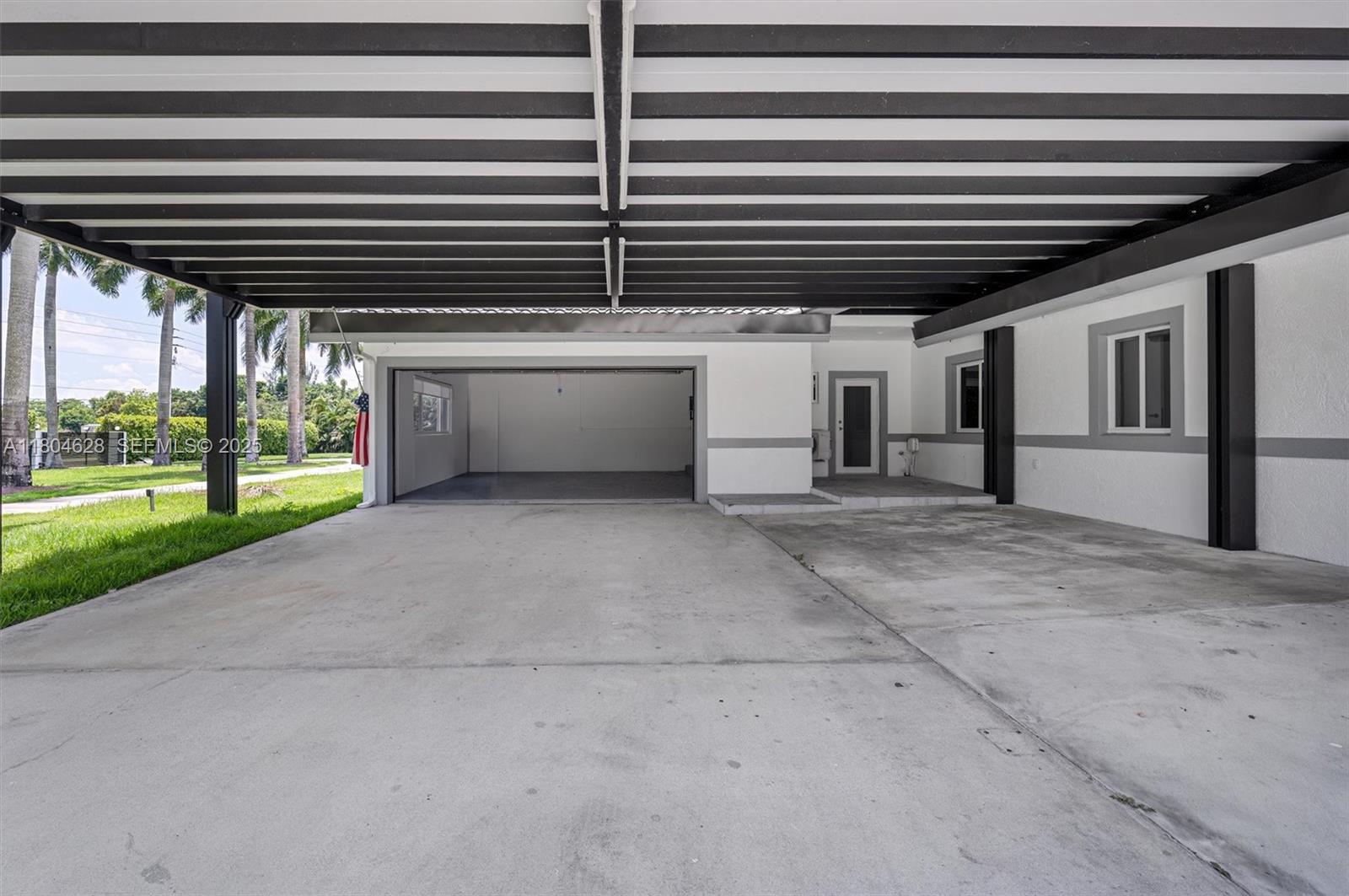 5121 Southwest 210th Terrace Southwest Ranches, FL 33332 - Photo 62 of 70 a view of a porch with a table and chairs and a barbeque with wooden roof