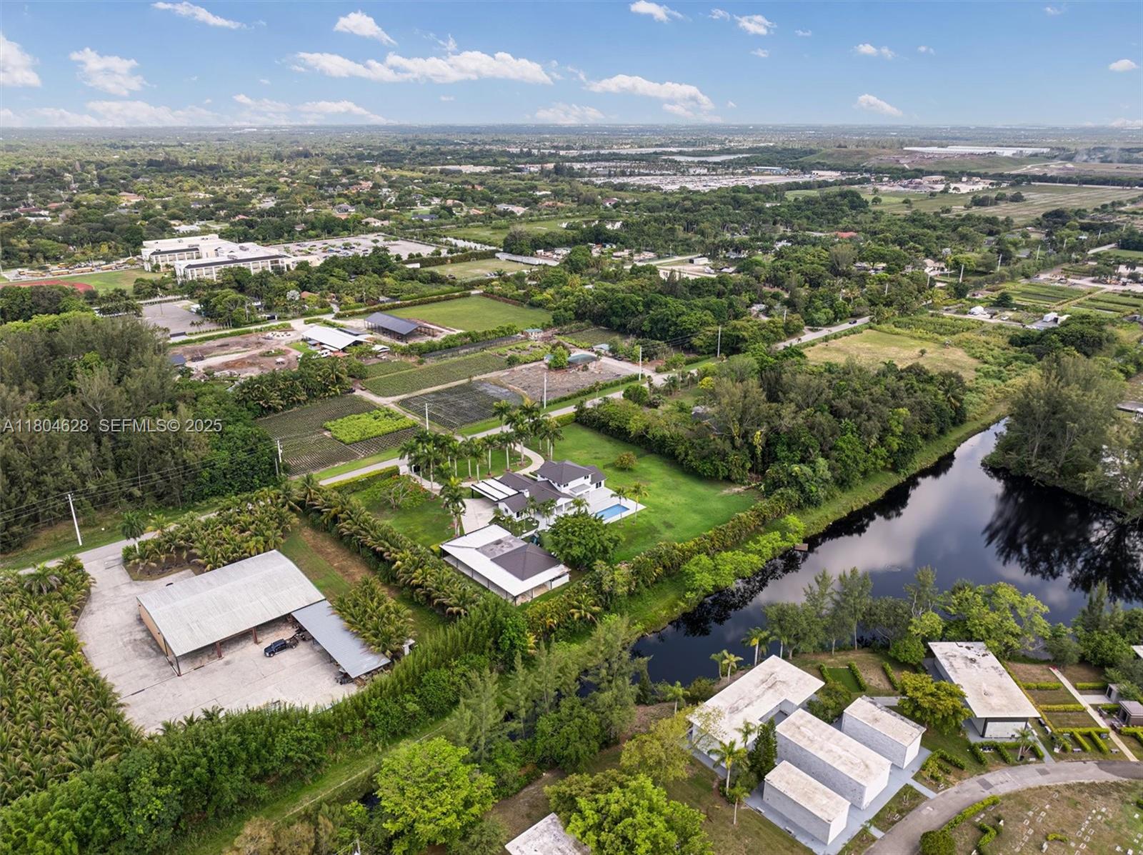 5121 Southwest 210th Terrace Southwest Ranches, FL 33332 - Photo 67 of 70 an aerial view of a city with lots of residential buildings