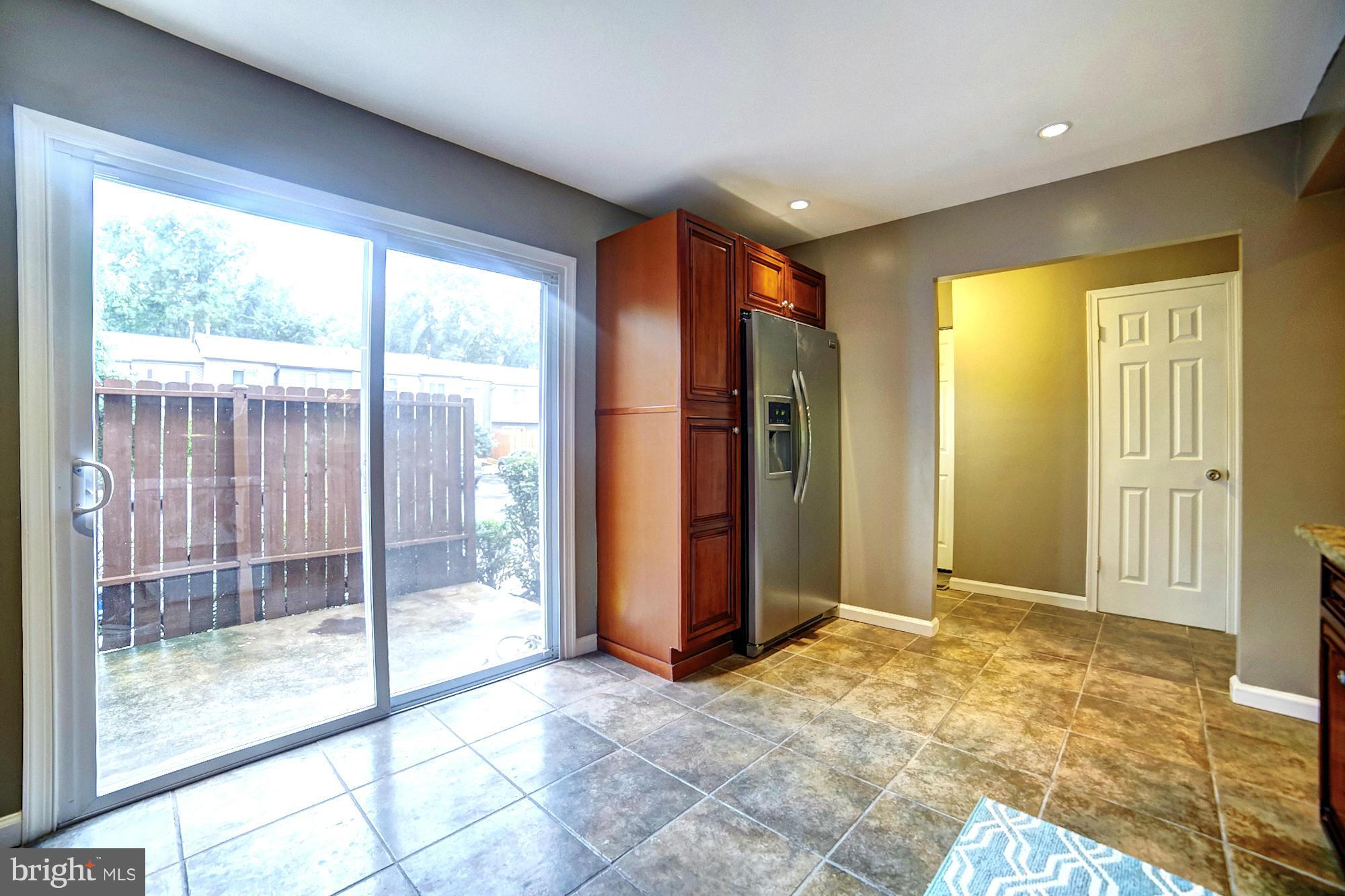 8248 Vosges Road Baltimore, MD 21244 - Photo 4 of 23 Private Patio off Kitchen