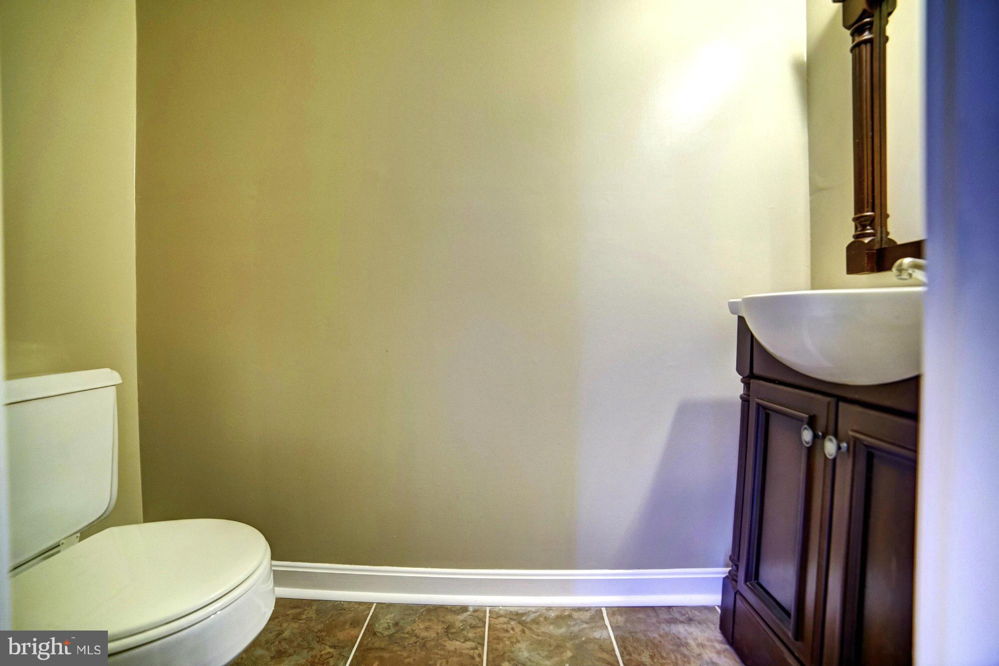 8248 Vosges Road Baltimore, MD 21244 - Photo 9 of 23 Convenient Main Level Bath