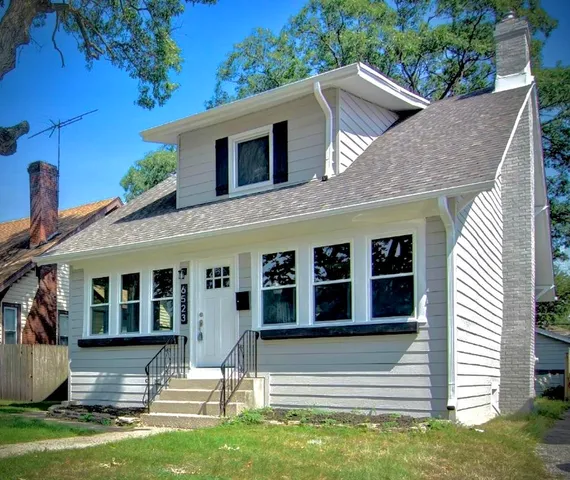 a house view with a garden space