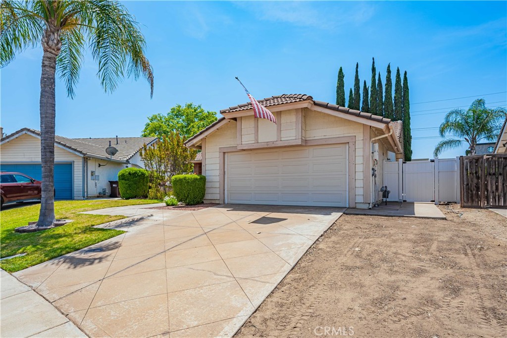 27571 Cabrillo Drive Menifee, CA 92586 - Photo 56 of 56 a front view of a house with garden