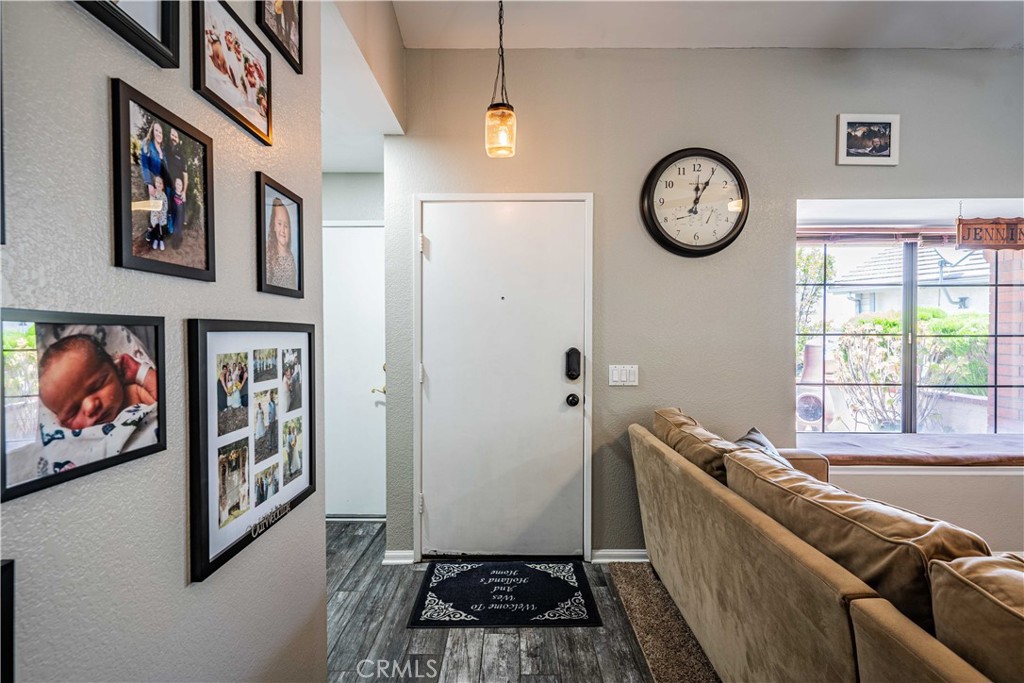 27571 Cabrillo Drive Menifee, CA 92586 - Photo 8 of 56 a living room with furniture and a window