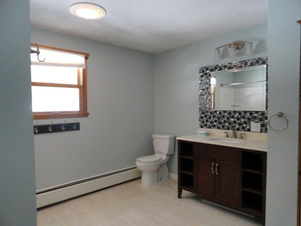 212 N Road Westhampton, MA 01027 - Photo 16 of 29 a bathroom with a sink toilet and window