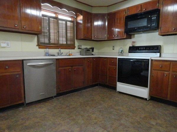 212 N Road Westhampton, MA 01027 - Photo 24 of 29 a kitchen with stainless steel appliances granite countertop a stove a sink and a microwave