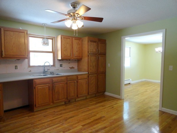 212 N Road Westhampton, MA 01027 - Photo 9 of 29 a view of a kitchen cabinets a sink and wooden floor