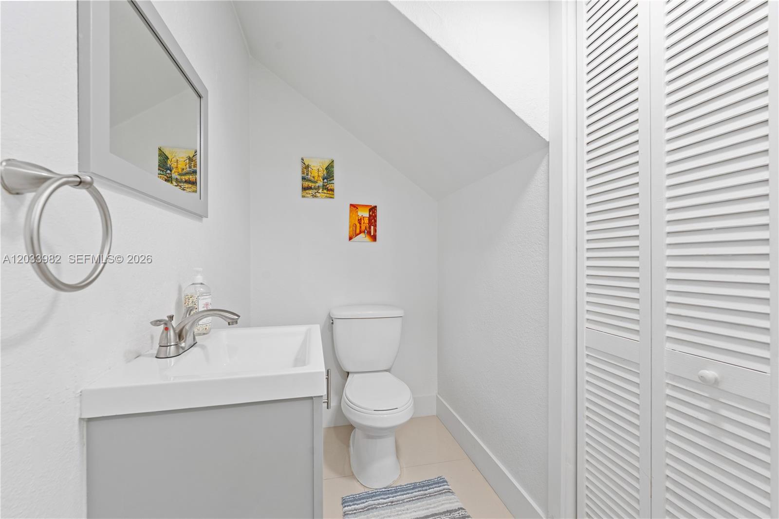 9780 Southwest 19th Street Miami, FL 33165 - Photo 22 of 34 Half bath downstairs