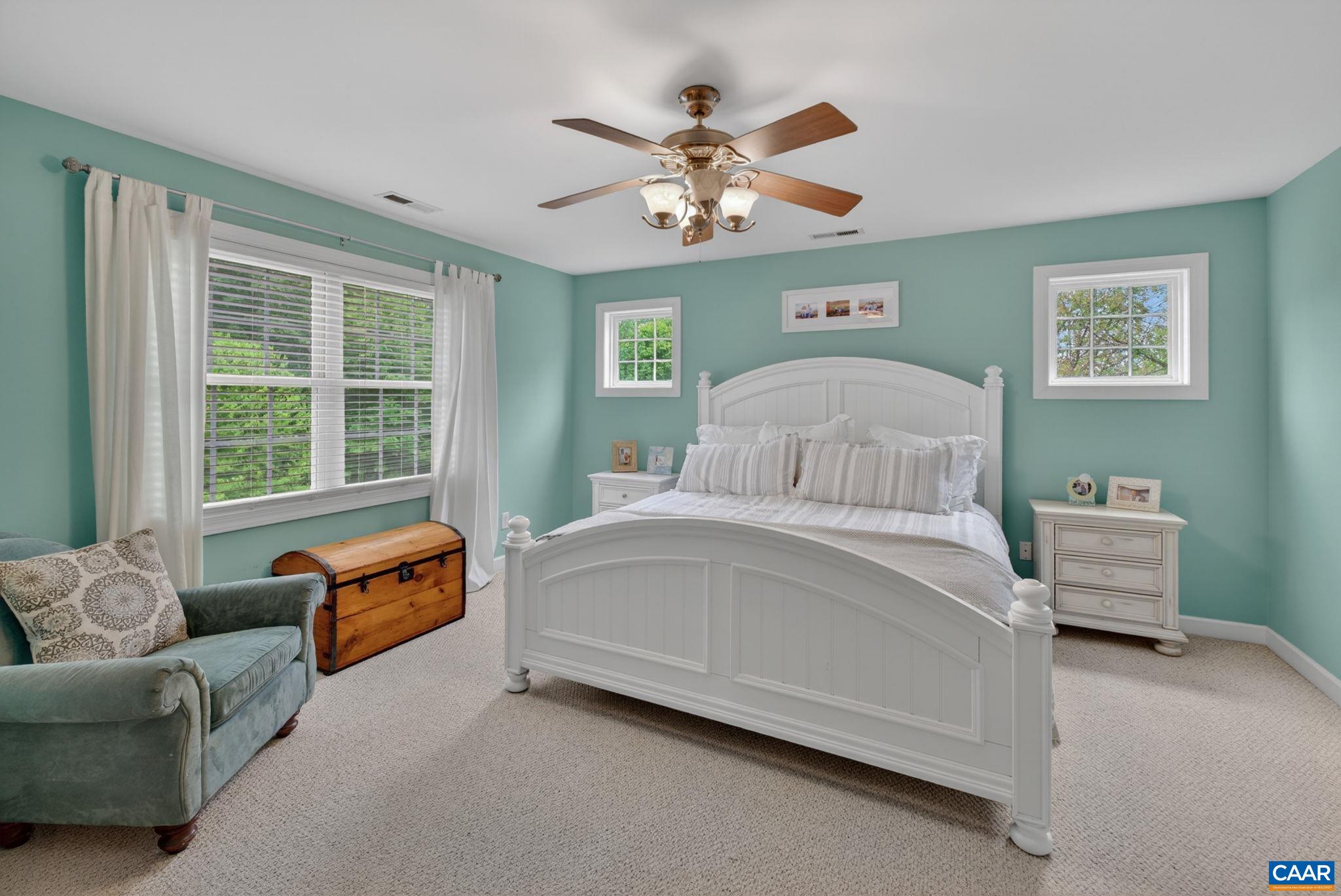 511 Taylor Ridge Way Palmyra, VA 22963 - Photo 30 of 57 a bedroom with a bed couch and window