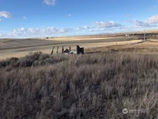 a view of an ocean and a yard