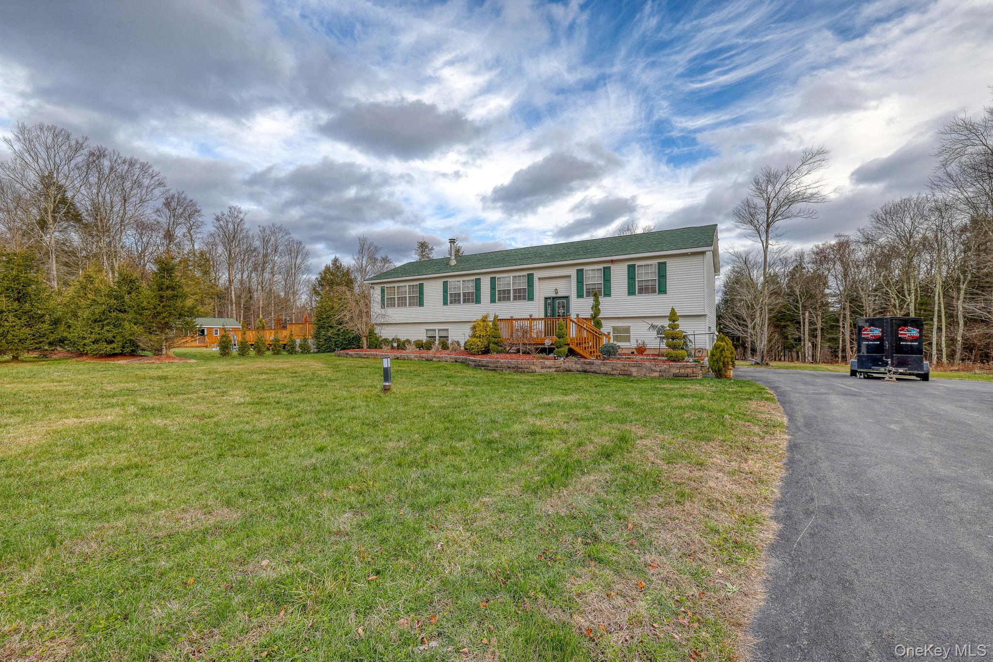 226 Big Woods Road Harris, NY 12742 - Photo 3 of 39 Front of house, blacktop drive and cabana