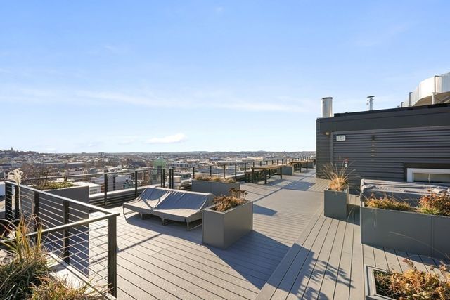 a view of a terrace with seating area