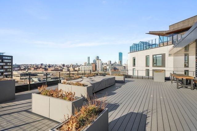 a view of a terrace with seating area