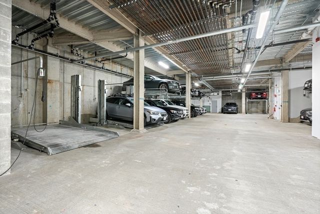 a front view of a building with traffic signal lights