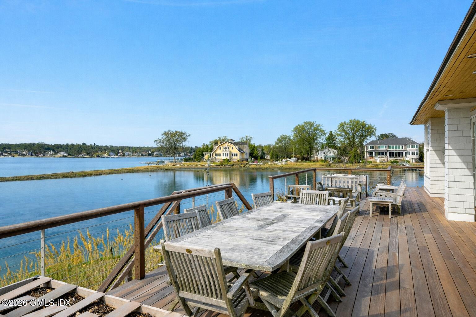 189 Shore Road Old Greenwich, CT 06870 - Photo 29 of 38 a terrace with outdoor seating and city view