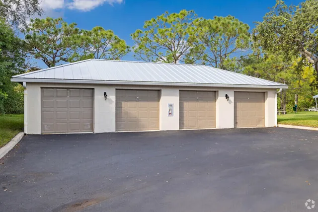a outdoor living space with furniture and a potted plant