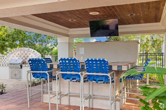 a view of a terrace with furniture and a table