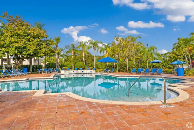 a view of entrance gate of the house and tree