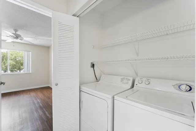 a utility room with dryer and washer