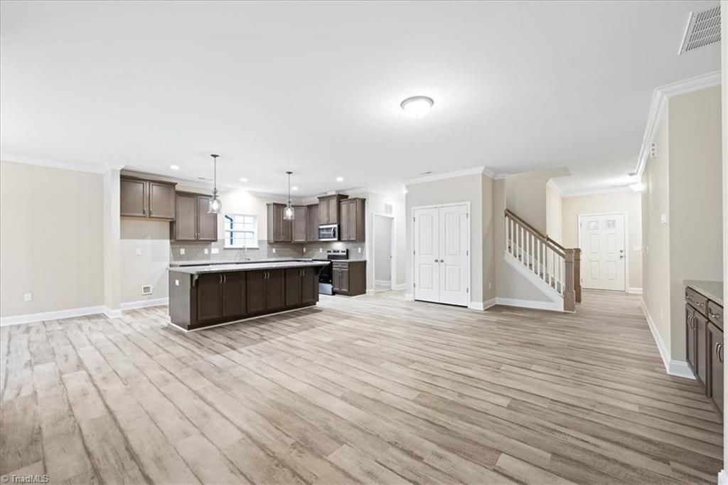 1987 Meadowview Drive Graham, NC 27253 - Photo 3 of 23 kitchen opens into great room