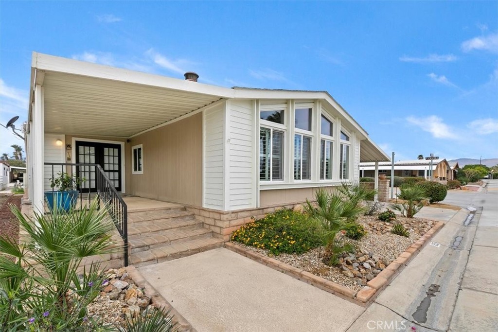 46618 Madison Street, Unit 85 Indio, CA 92201 - Photo 13 of 50 a house view with a outdoor space