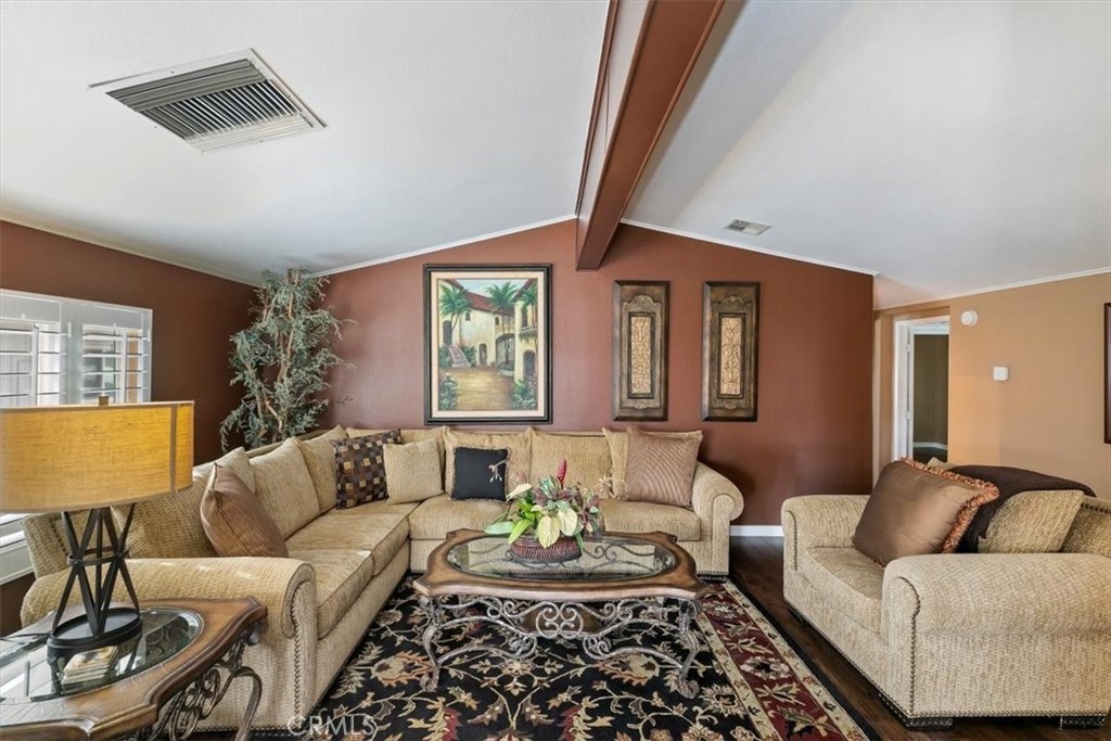 46618 Madison Street, Unit 85 Indio, CA 92201 - Photo 24 of 50 a living room with furniture and a rug