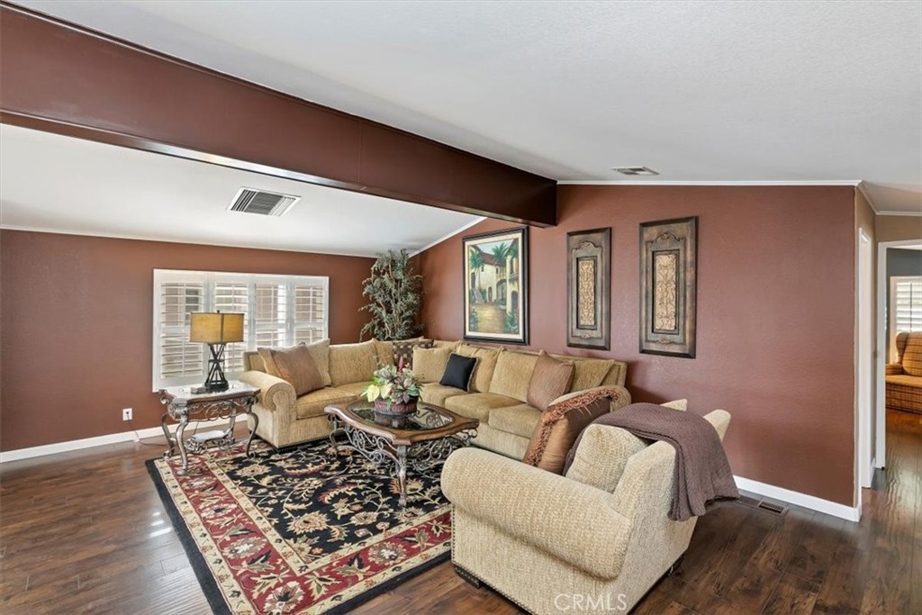 46618 Madison Street, Unit 85 Indio, CA 92201 - Photo 25 of 50 a living room with furniture and a rug