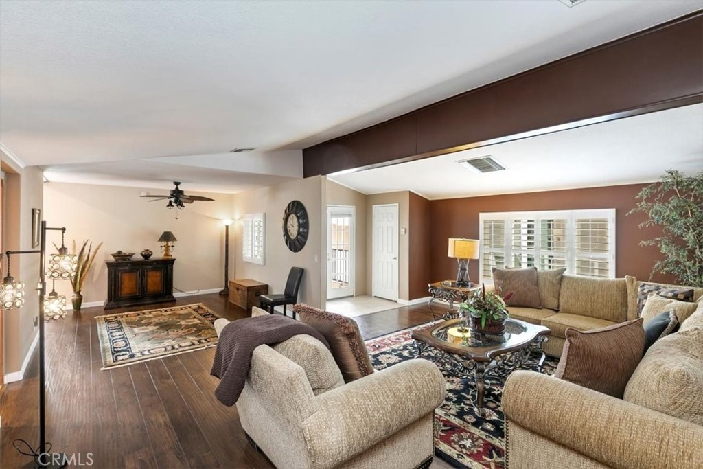 46618 Madison Street, Unit 85 Indio, CA 92201 - Photo 27 of 50 a living room with furniture and a large window
