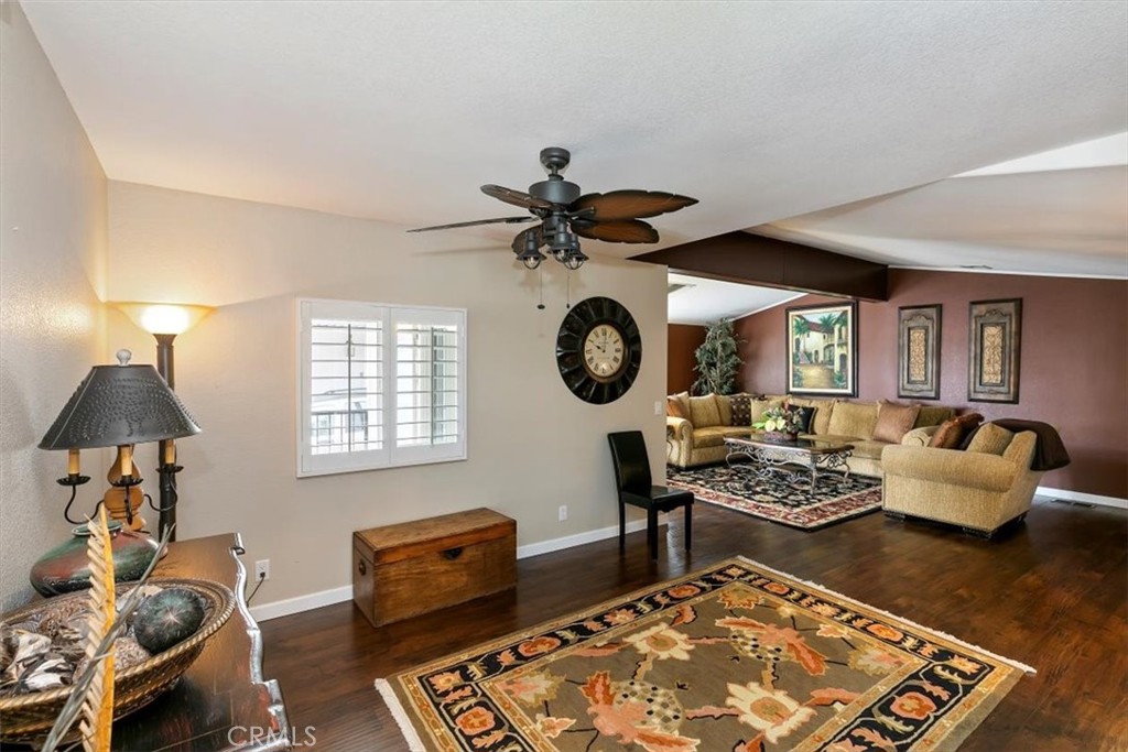 46618 Madison Street, Unit 85 Indio, CA 92201 - Photo 29 of 50 a living room with furniture a rug and a window