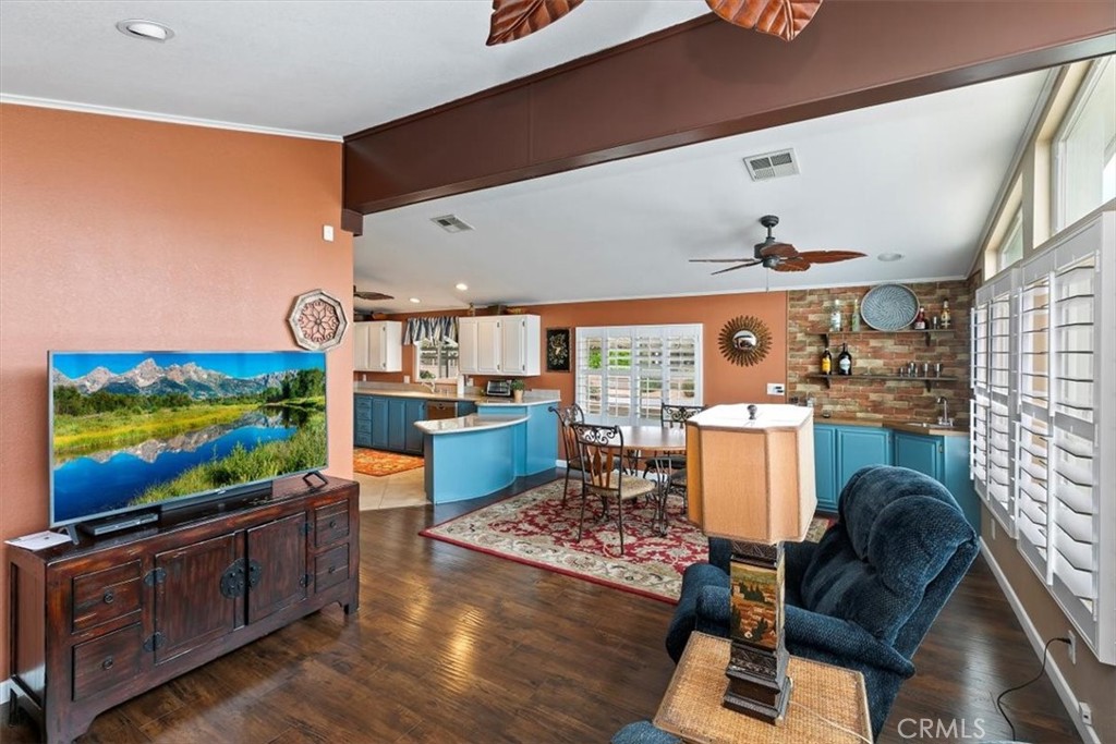 46618 Madison Street, Unit 85 Indio, CA 92201 - Photo 38 of 50 a living room with furniture and a flat screen tv