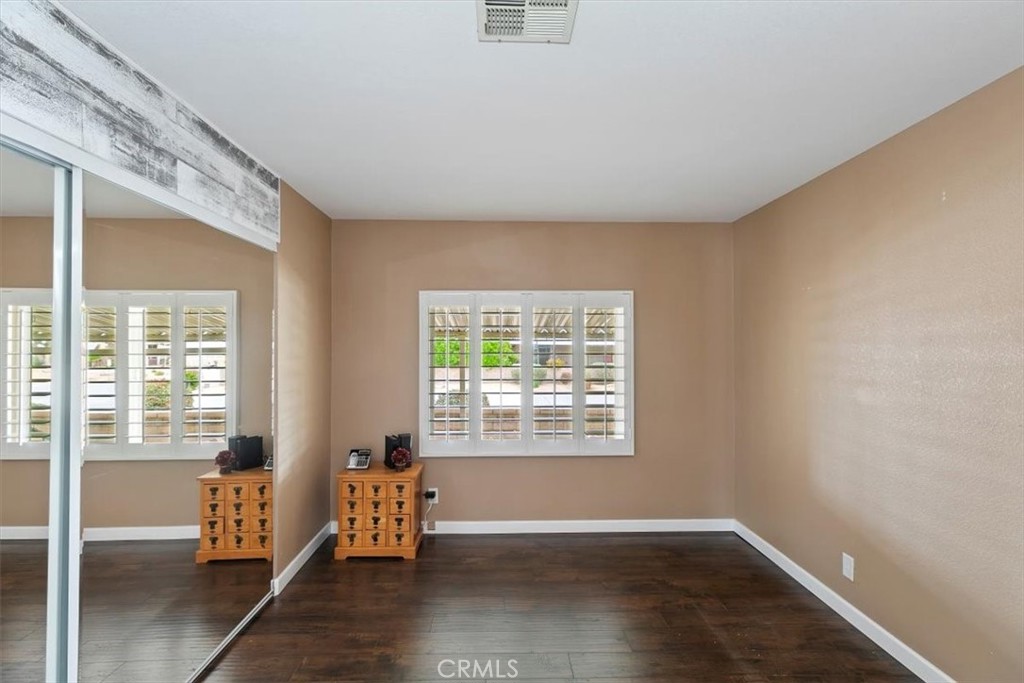 46618 Madison Street, Unit 85 Indio, CA 92201 - Photo 49 of 50 a living room with furniture and wooden floor