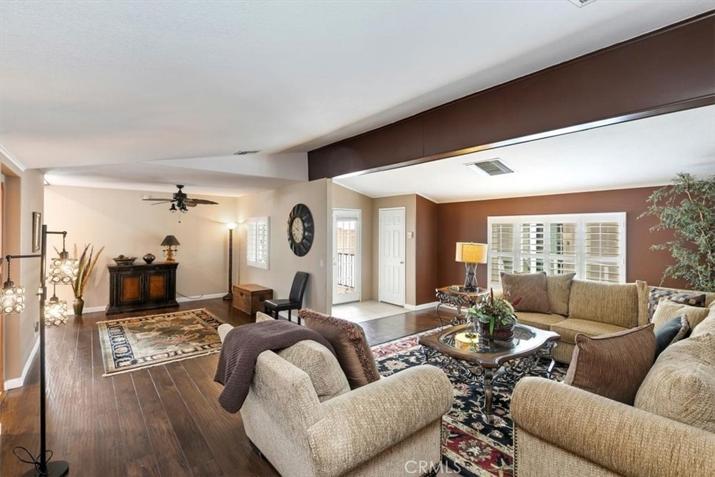 46618 Madison Street, Unit 85 Indio, CA 92201 - Photo 5 of 50 a living room with furniture and a large window