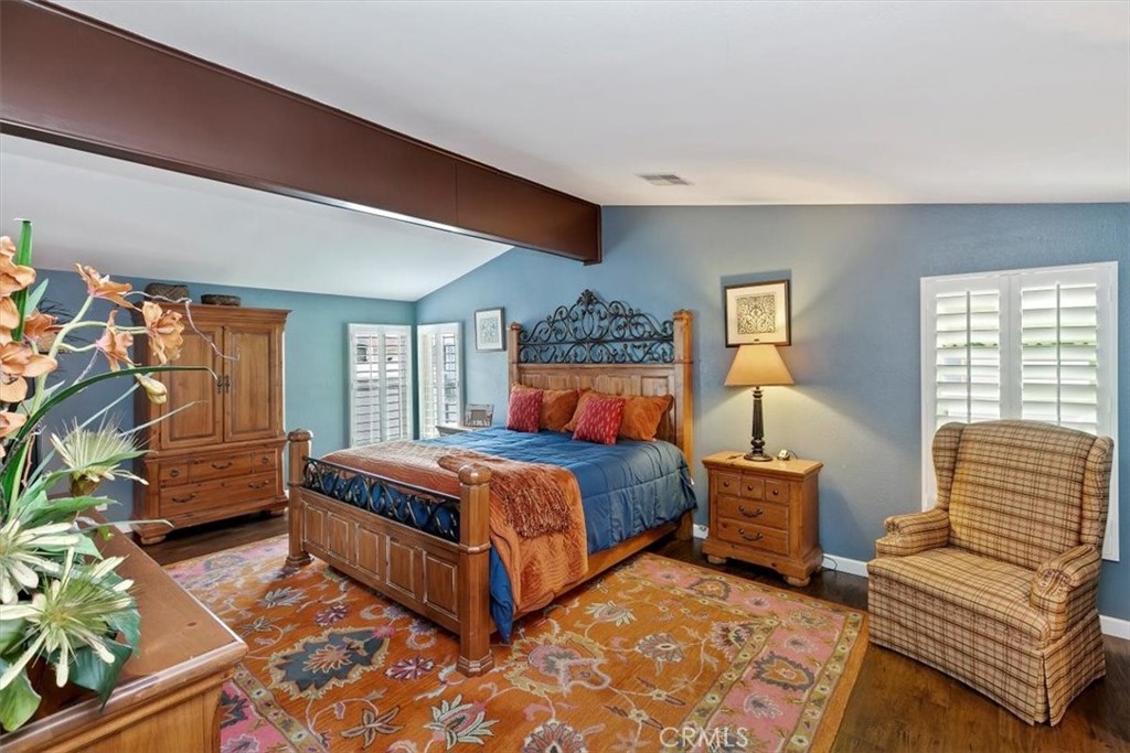 46618 Madison Street, Unit 85 Indio, CA 92201 - Photo 7 of 50 a bedroom with a bed and a couch