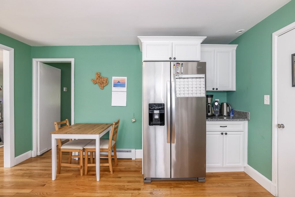 4 Ellis Drive Worcester, MA 01609 - Photo 11 of 32 a kitchen with stainless steel appliances a refrigerator and a table