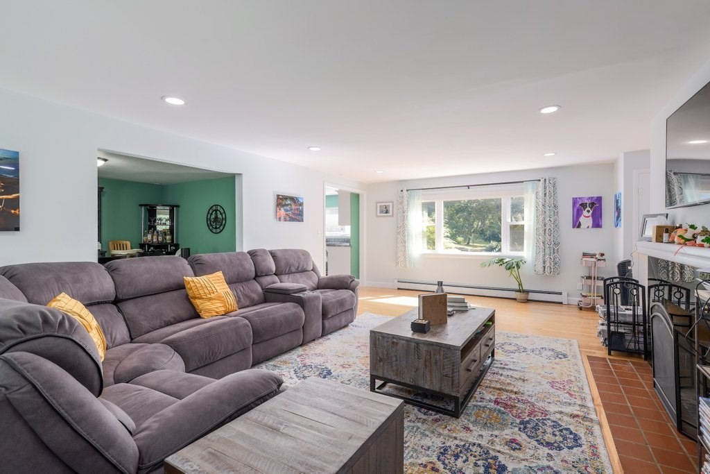 4 Ellis Drive Worcester, MA 01609 - Photo 17 of 32 a living room with furniture and a window
