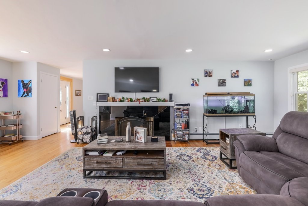 4 Ellis Drive Worcester, MA 01609 - Photo 18 of 32 a living room with furniture and a fireplace