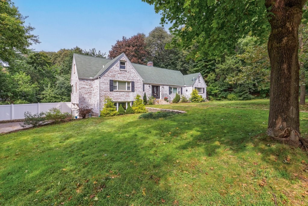 4 Ellis Drive Worcester, MA 01609 - Photo 2 of 32 a front view of a house with garden