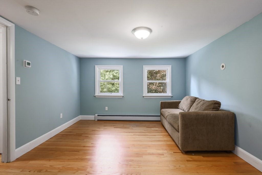 4 Ellis Drive Worcester, MA 01609 - Photo 29 of 32 a living room with couch and a window