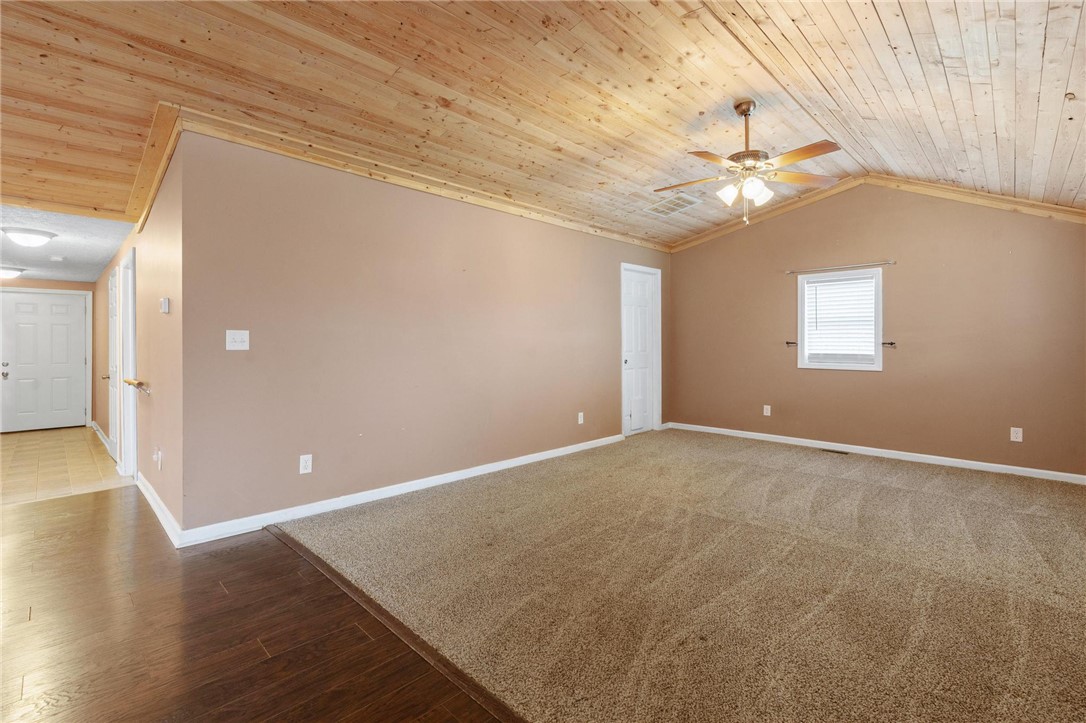 885 Hook Road Xenia, OH 45385 - Photo 5 of 33 This inviting room features a vaulted wood ceiling and comfortable carpeting