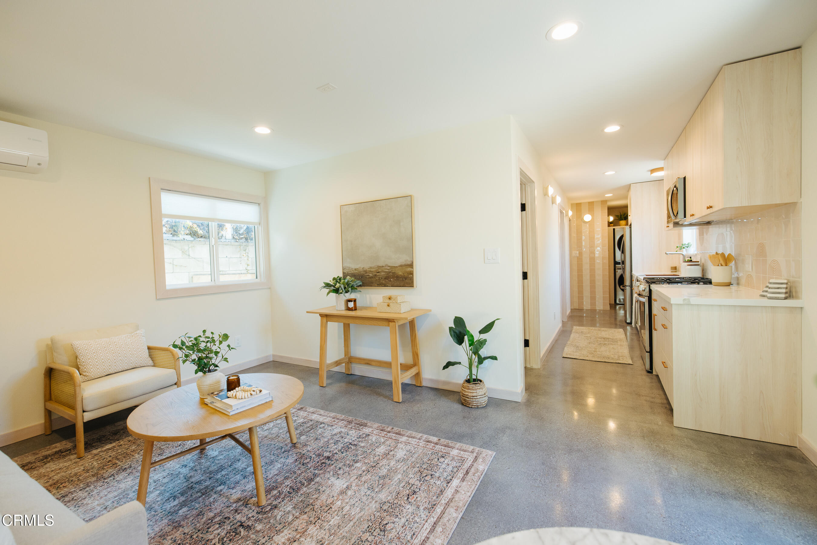 152 Arcade Drive Ventura, CA 93003 - Photo 2 of 25 a living room with furniture and a table