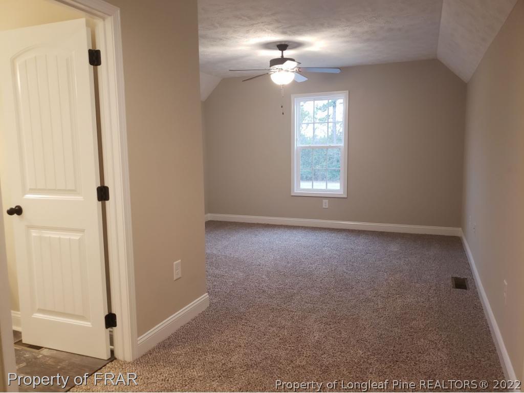 2945 Hayfield Road Wade, NC 28395 - Photo 5 of 26 a view of empty room with window