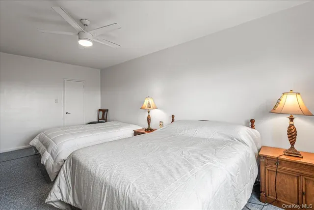 a bathroom with a sink a mirror and a shower curtain