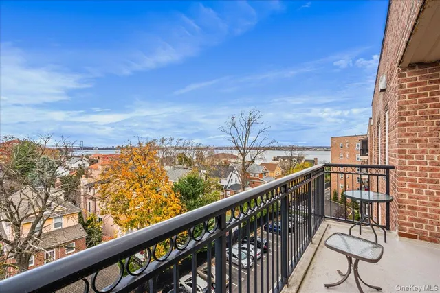 a bedroom with two beds and a window