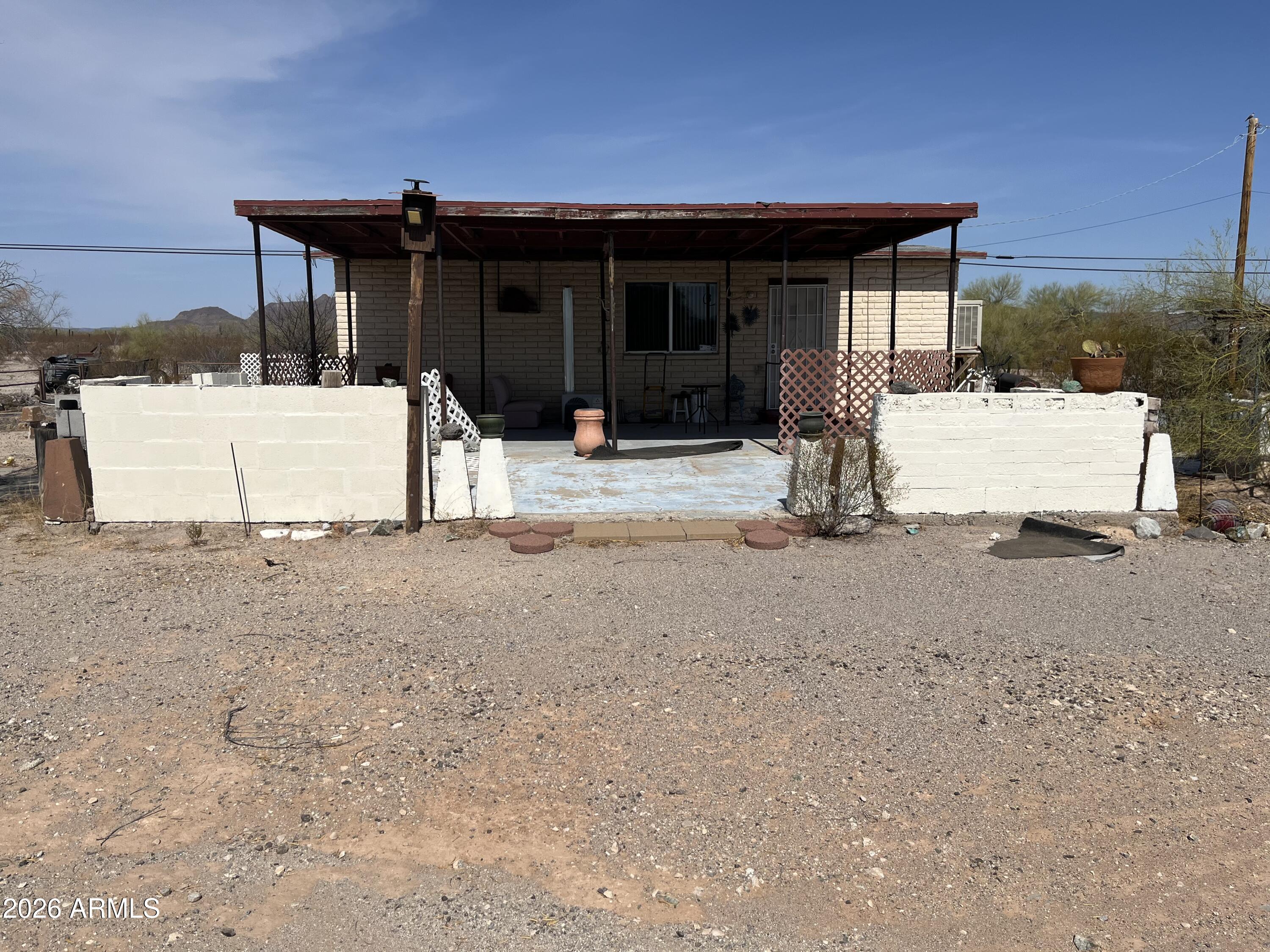 3610 North Elliott Road Ajo, AZ 85321 - Photo 4 of 20 a view of a house with a patio