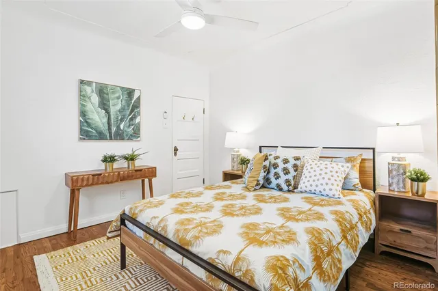 a bedroom with a bed and a table